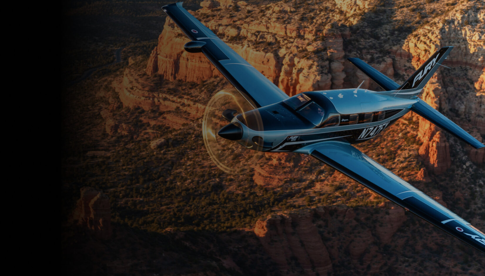 M700 plane flying over the canyon
